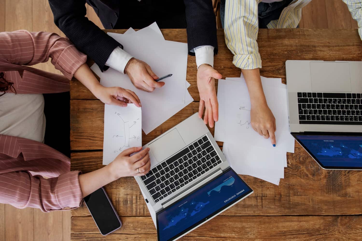 Professional translation team collaborating in an office